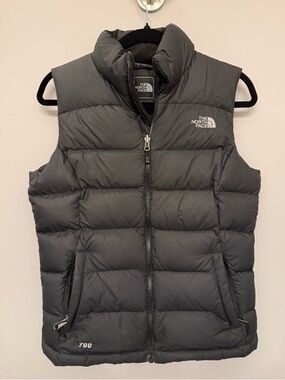 The North Face Black Puffer Vest with White Logo Patch
